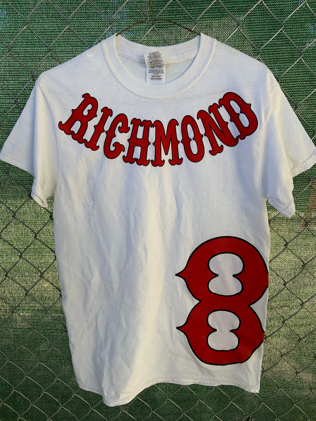 White shirt with red richmond on collar