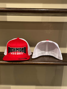 Red and white flex fit trucker hat with richmond puff on front