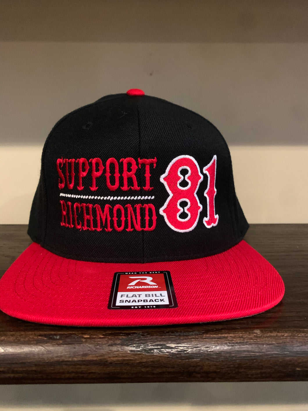 Black SnapBack with red bill