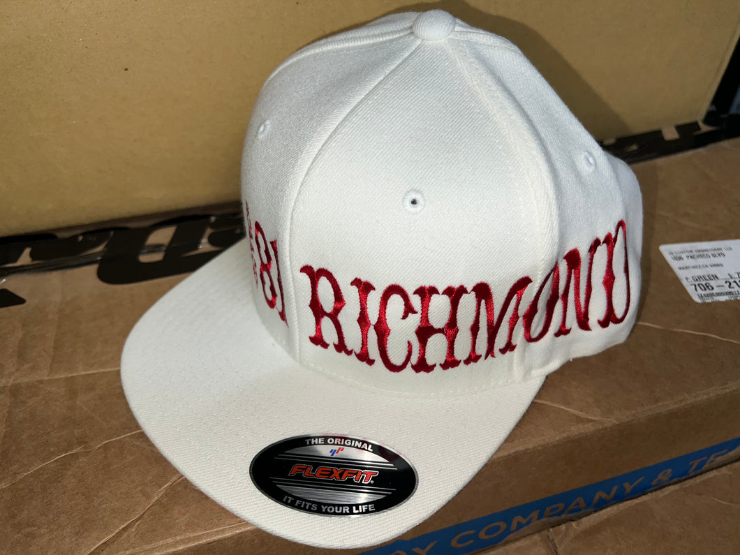 White fitted hat with red writing