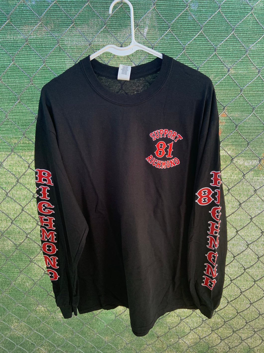 Men’s black long sleeve with richmond down the arms