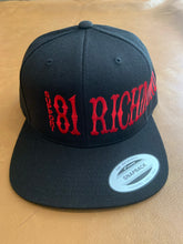 Load image into Gallery viewer, Black snap back hat with red writing
