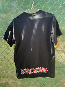 Black t shirt on red and white support block