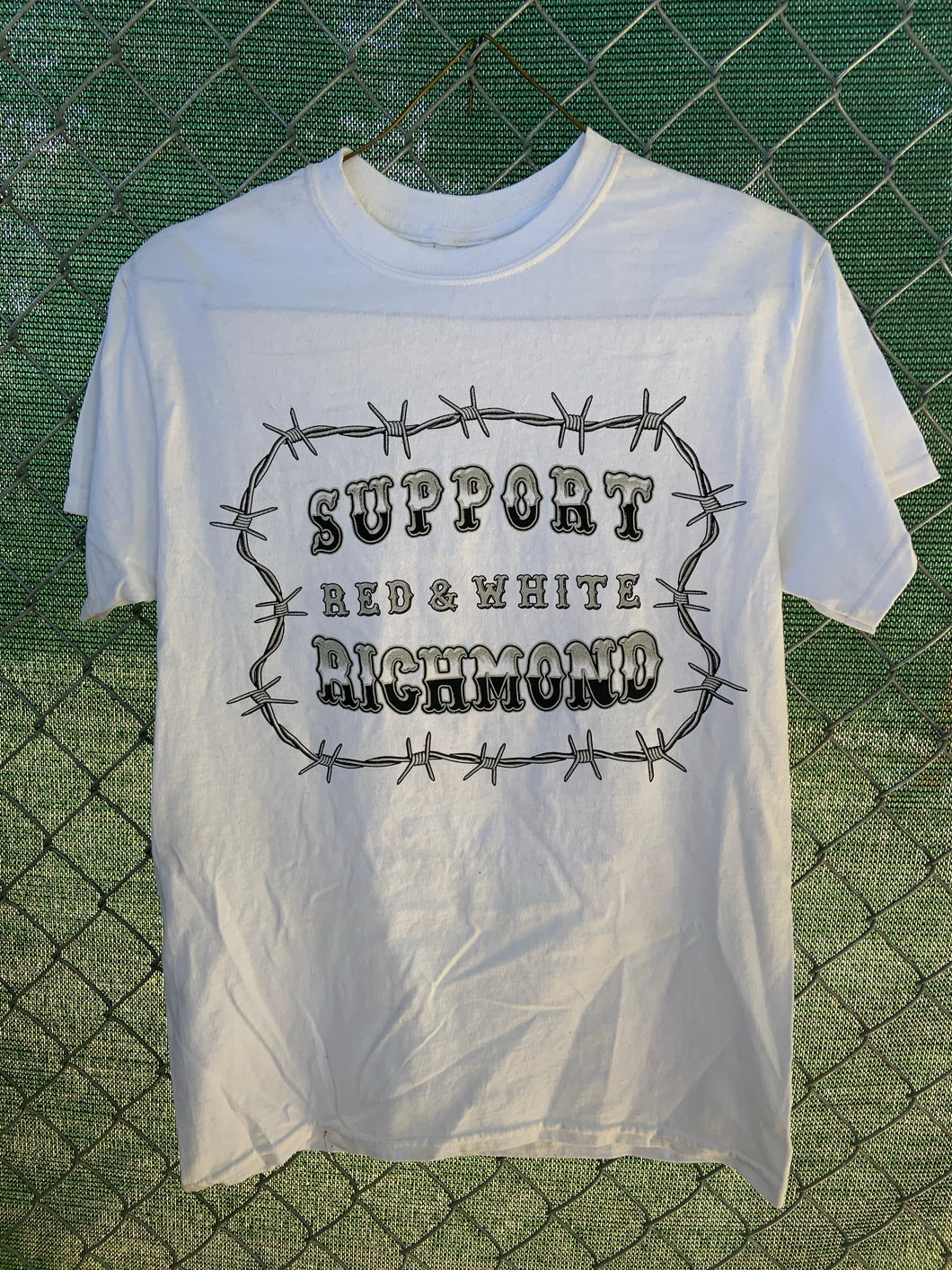 White shirt with black barbed wire