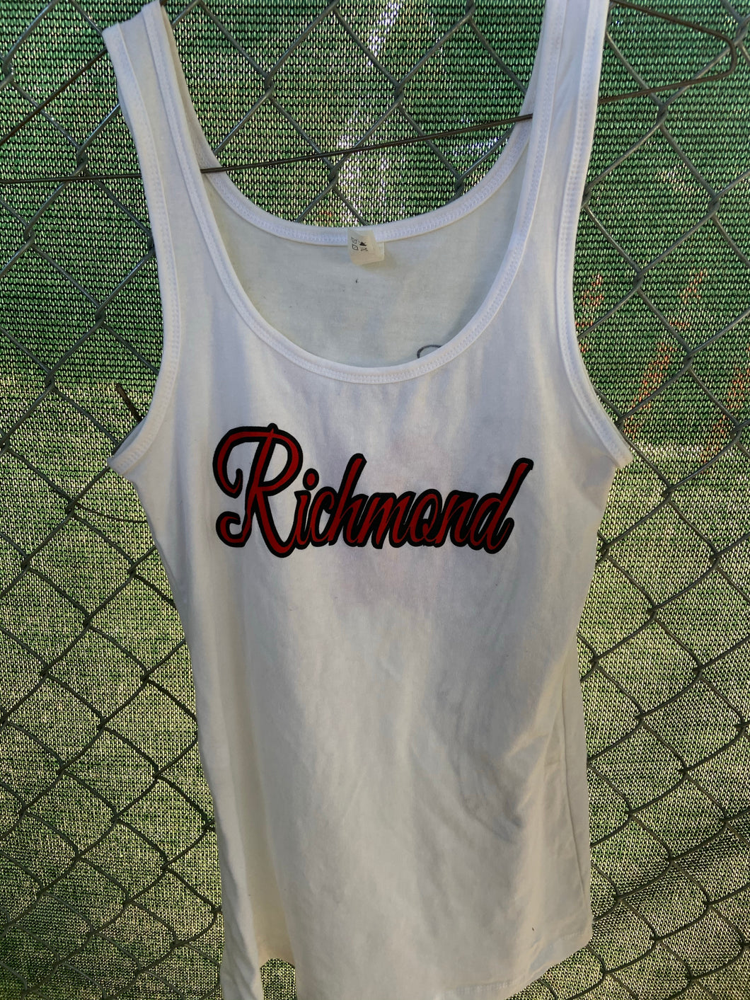 White tank with red writing and black outline
